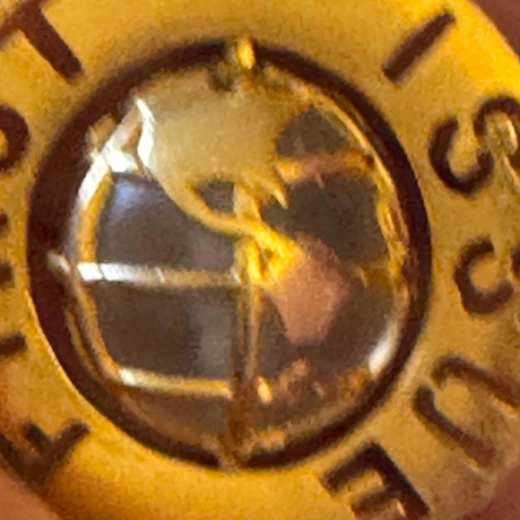 VTG G/T pendant featuring spinning globe w/text “First Issue” on outer ring - Picture 6 of 7